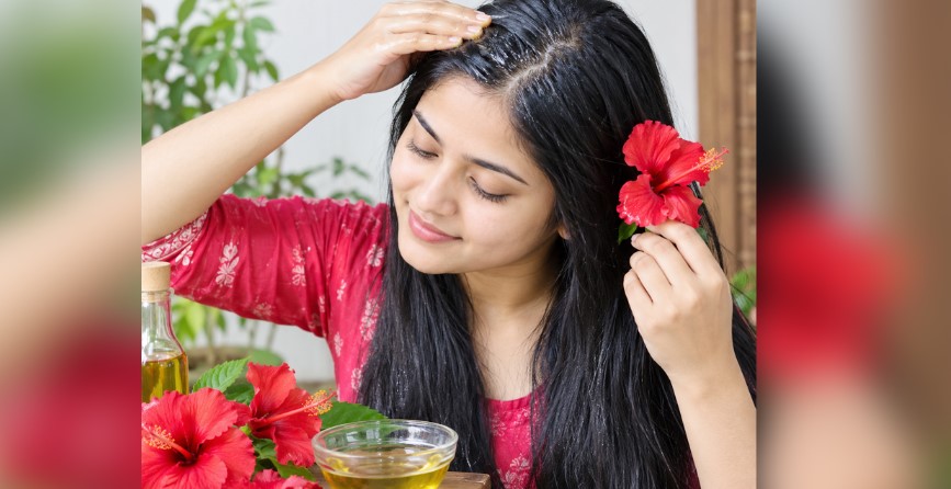 চুল ঝরে পড়া রোধে নারকেল তেলে মেশাবেন যে উপাদান